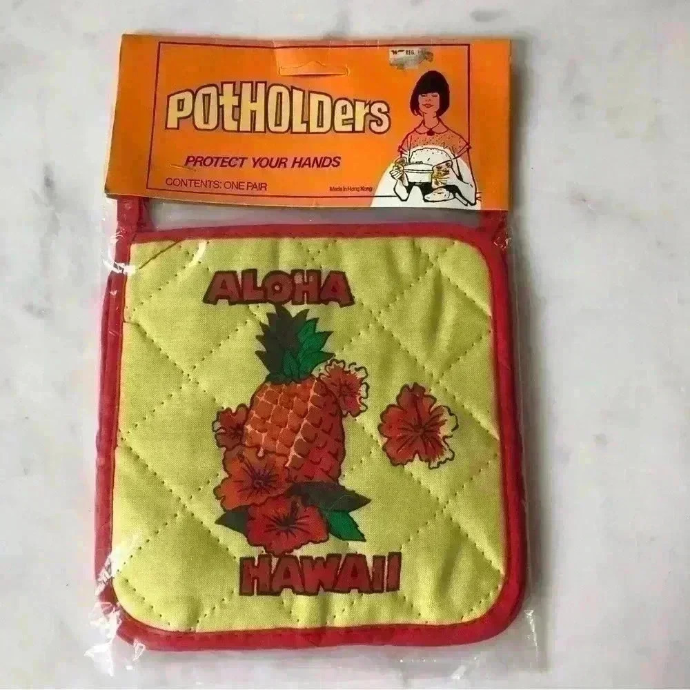 New in package! Pair of  vintage 1970s souvenir Hawaii potholders